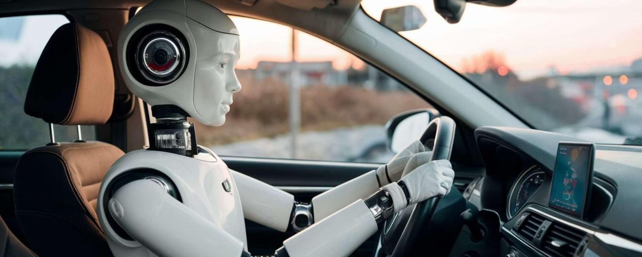 Questo robot umanoide può guidare le auto, più o meno